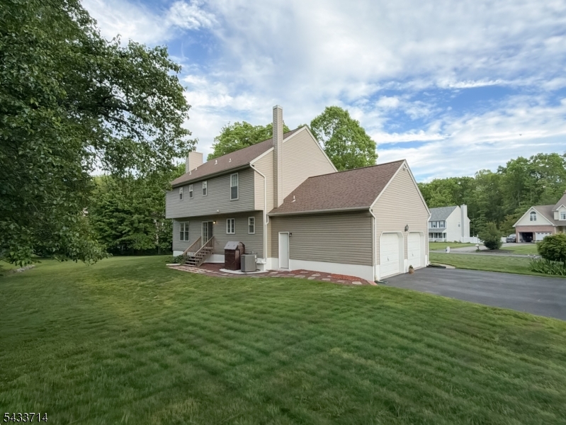 29 Lark Lane Oak Ridge, NJ 07438 - Photo 26 of 26 a view of a house with a yard