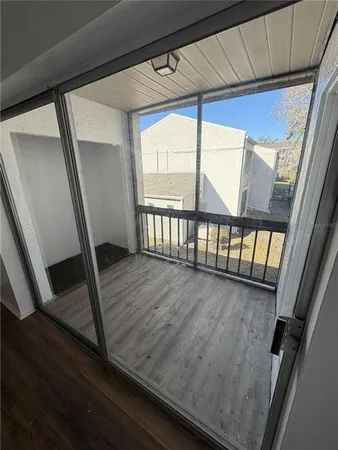 a view of entryway with wooden floor