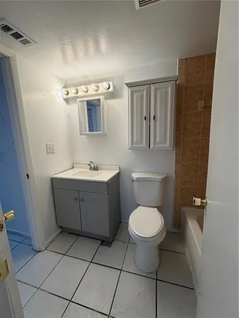 a view of balcony with furniture