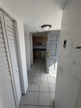 a view of a balcony with furniture