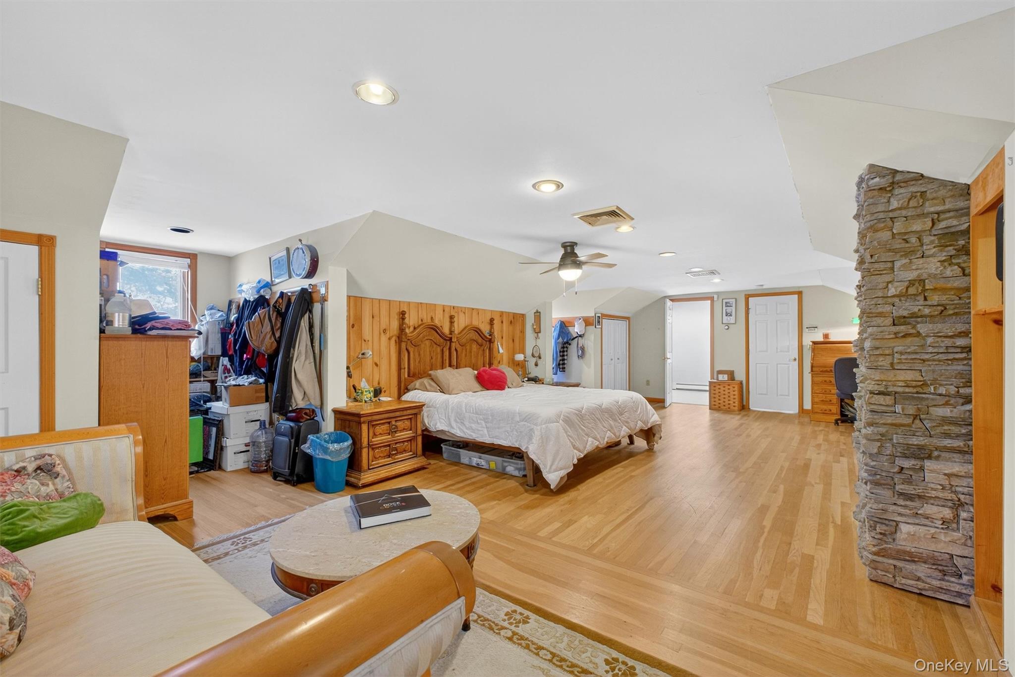 10 Byram Road Carmel, NY 10512 - Photo 18 of 49 a bedroom with a bed and a walk in closet