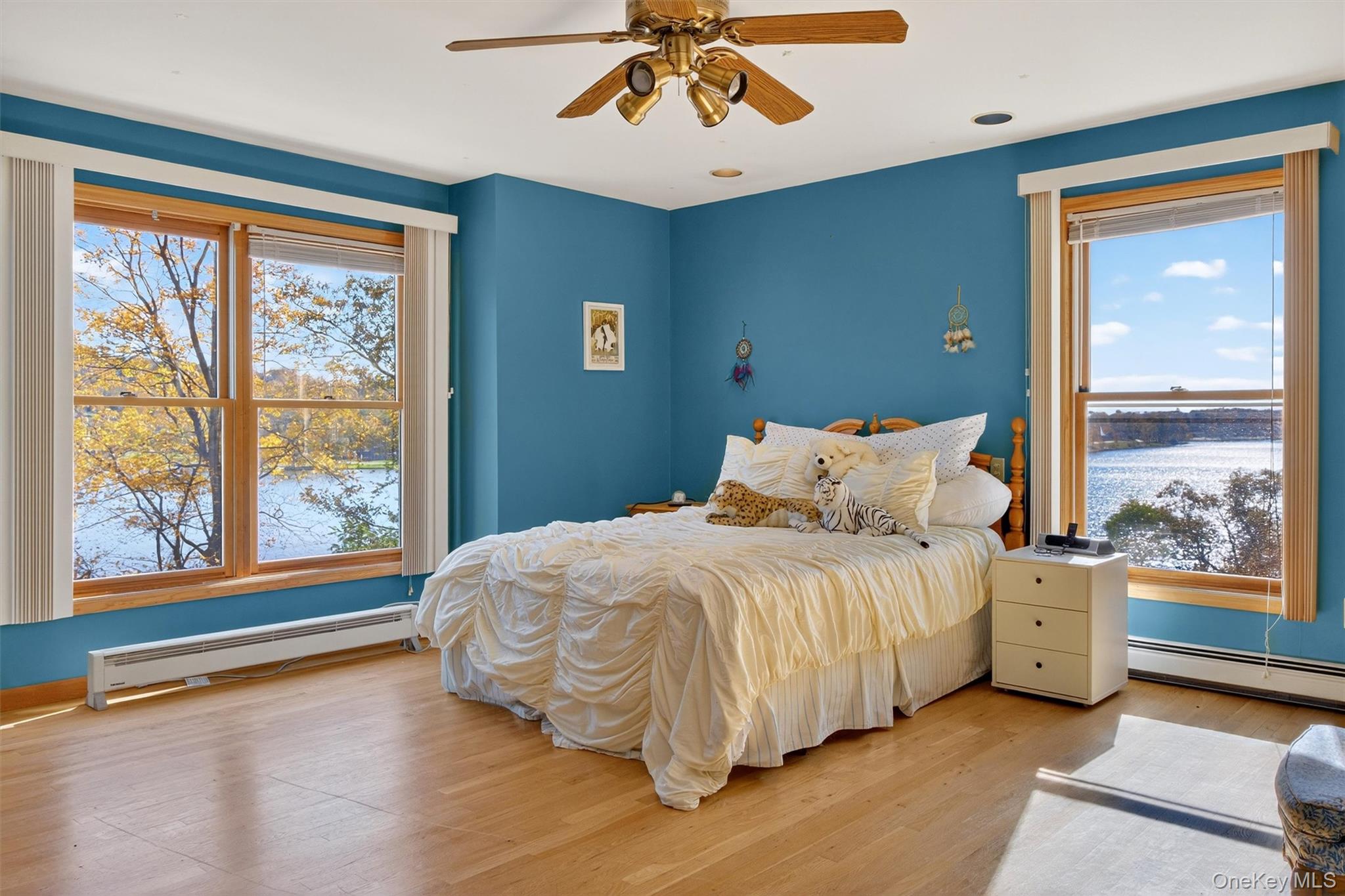 10 Byram Road Carmel, NY 10512 - Photo 20 of 49 a bedroom with a bed and a large window with outer view