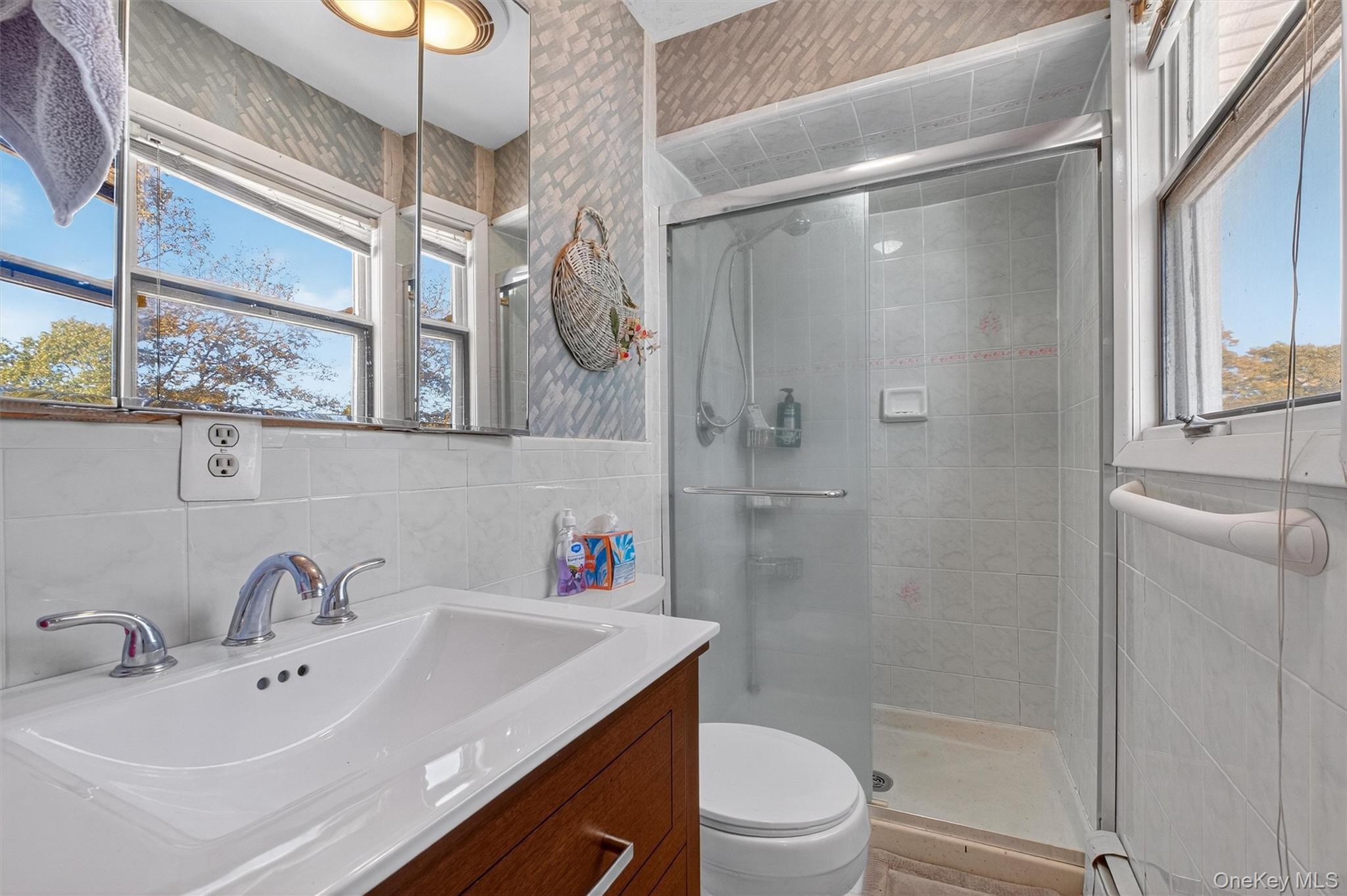 10 Byram Road Carmel, NY 10512 - Photo 21 of 49 a bathroom with a sink toilet and shower