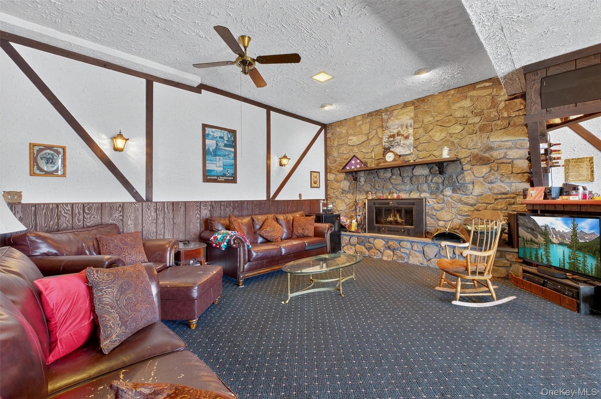10 Byram Road Carmel, NY 10512 - Photo 25 of 49 a living room with furniture and a fireplace