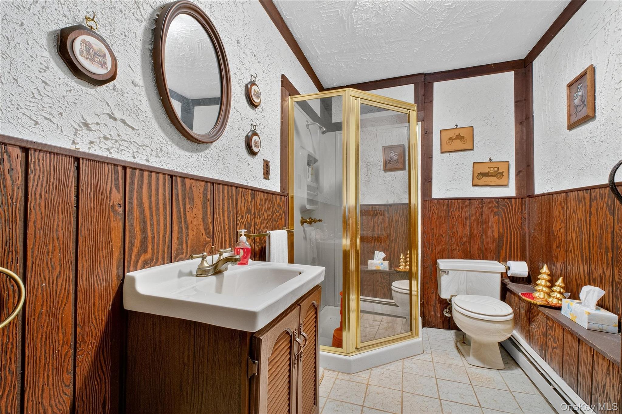 10 Byram Road Carmel, NY 10512 - Photo 28 of 49 a bathroom with a sink a toilet and shower