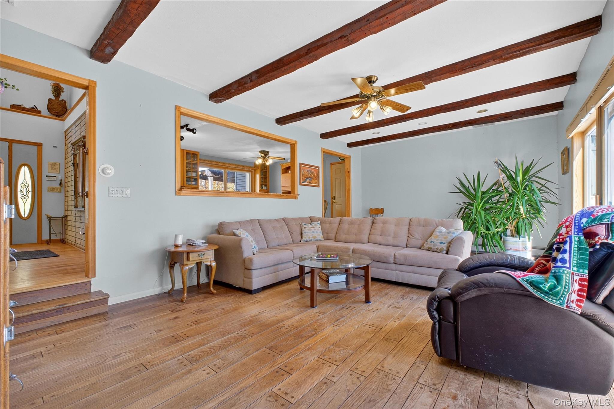 10 Byram Road Carmel, NY 10512 - Photo 6 of 49 a living room with furniture and a potted plant