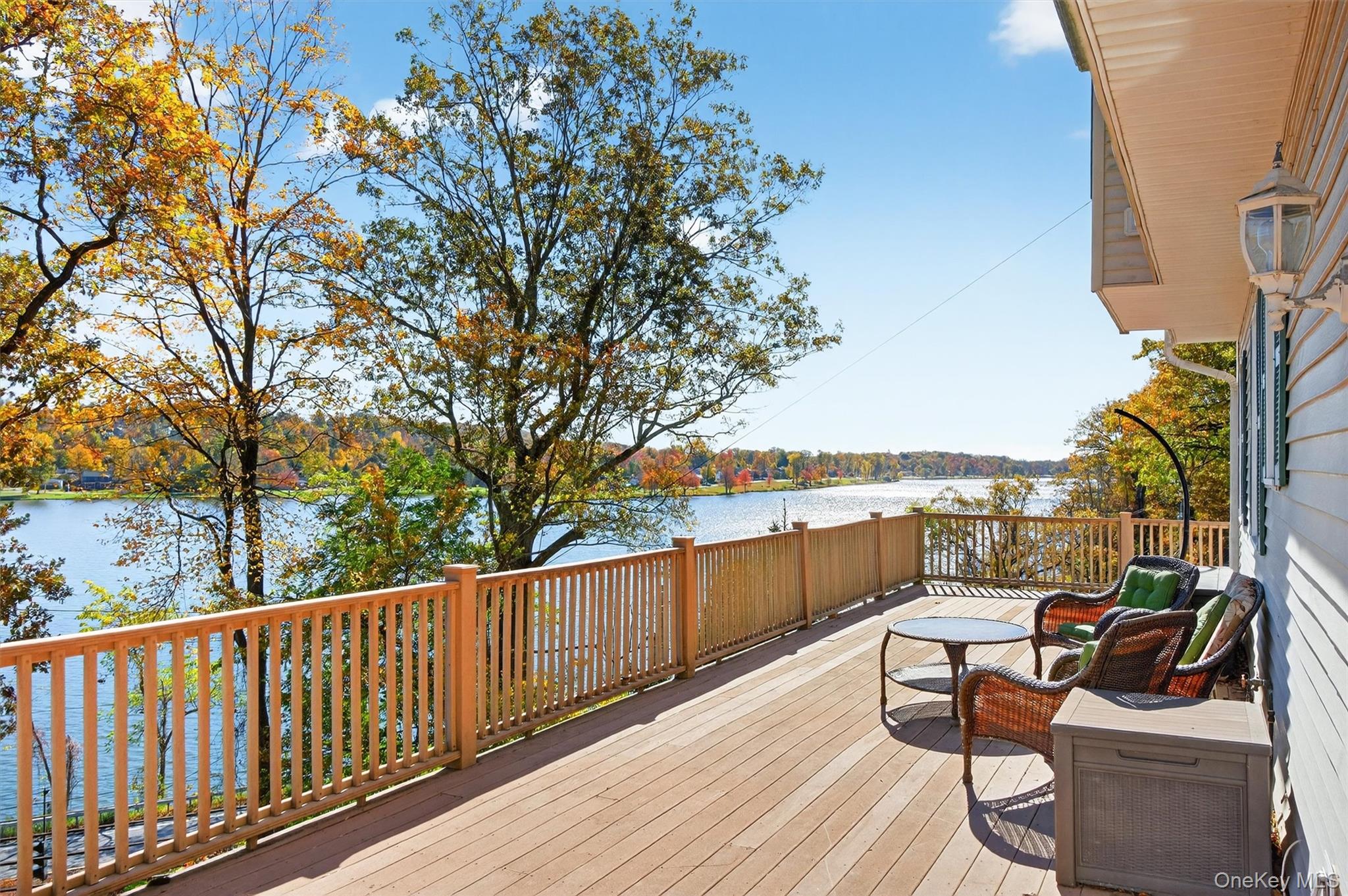 10 Byram Road Carmel, NY 10512 - Photo 7 of 49 a view of a balcony with couch and wooden fence