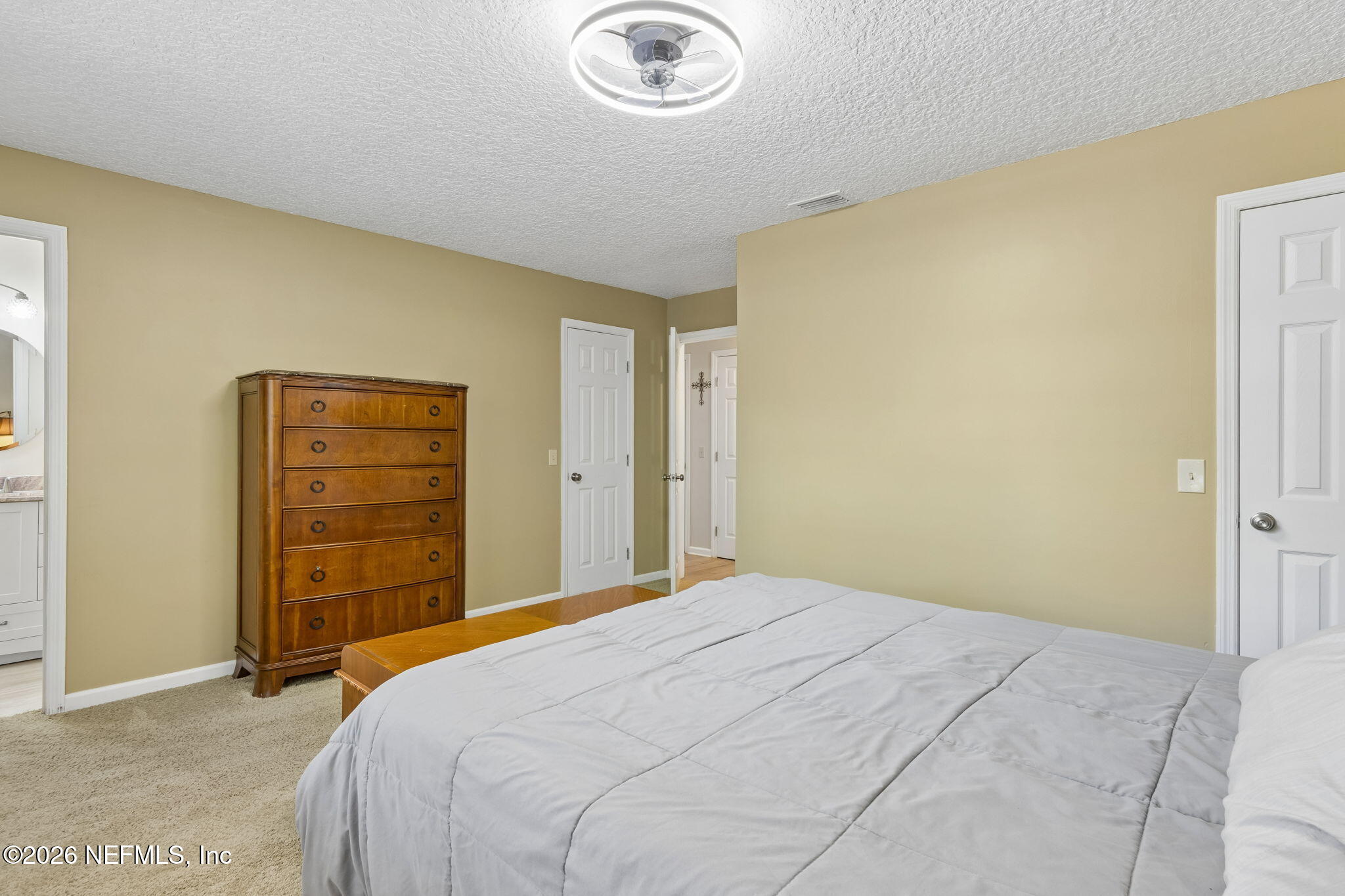 3194 Creighton Landing Road Fleming Island, FL 32003 - Photo 20 of 31 a bedroom with a bed and a closet