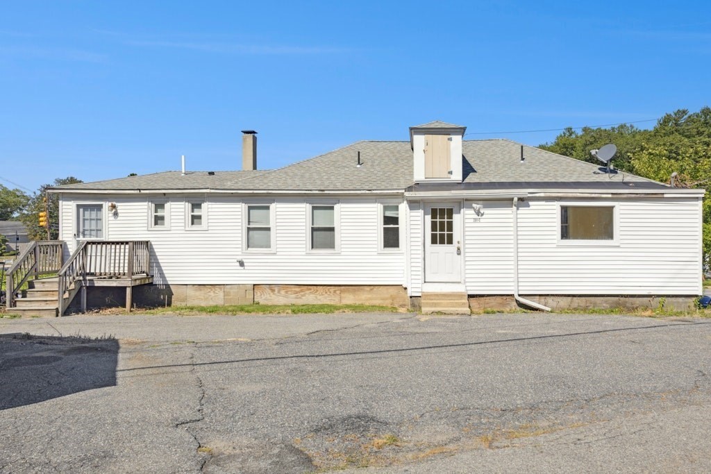 281 C King, Unit C Northborough, MA 01532 - Photo 17 of 19 a front view of a house with a empty space