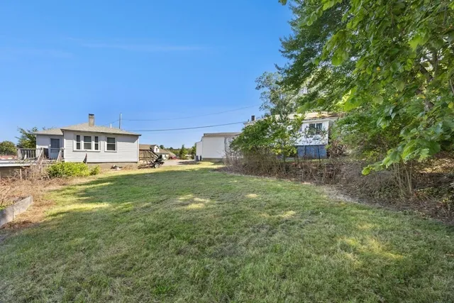 a view of a house with a big yard