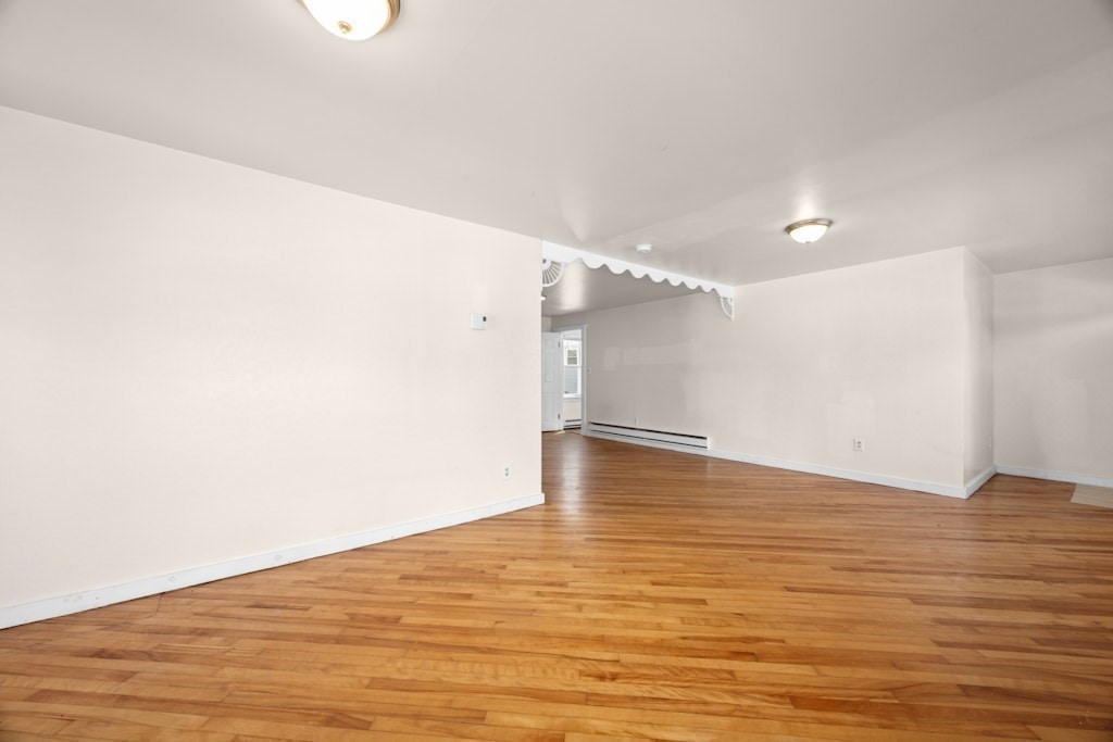 281 C King, Unit C Northborough, MA 01532 - Photo 8 of 19 a view of empty room with wooden floor