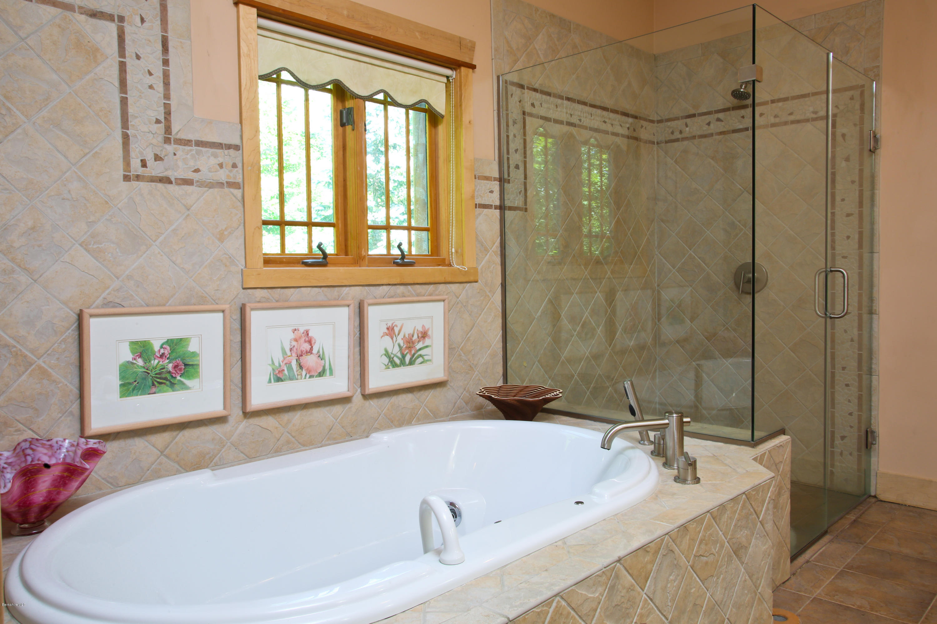 108 Valley View Road Becket, MA 01223 - Photo 14 of 35 a bathroom with a tub a window and a shower