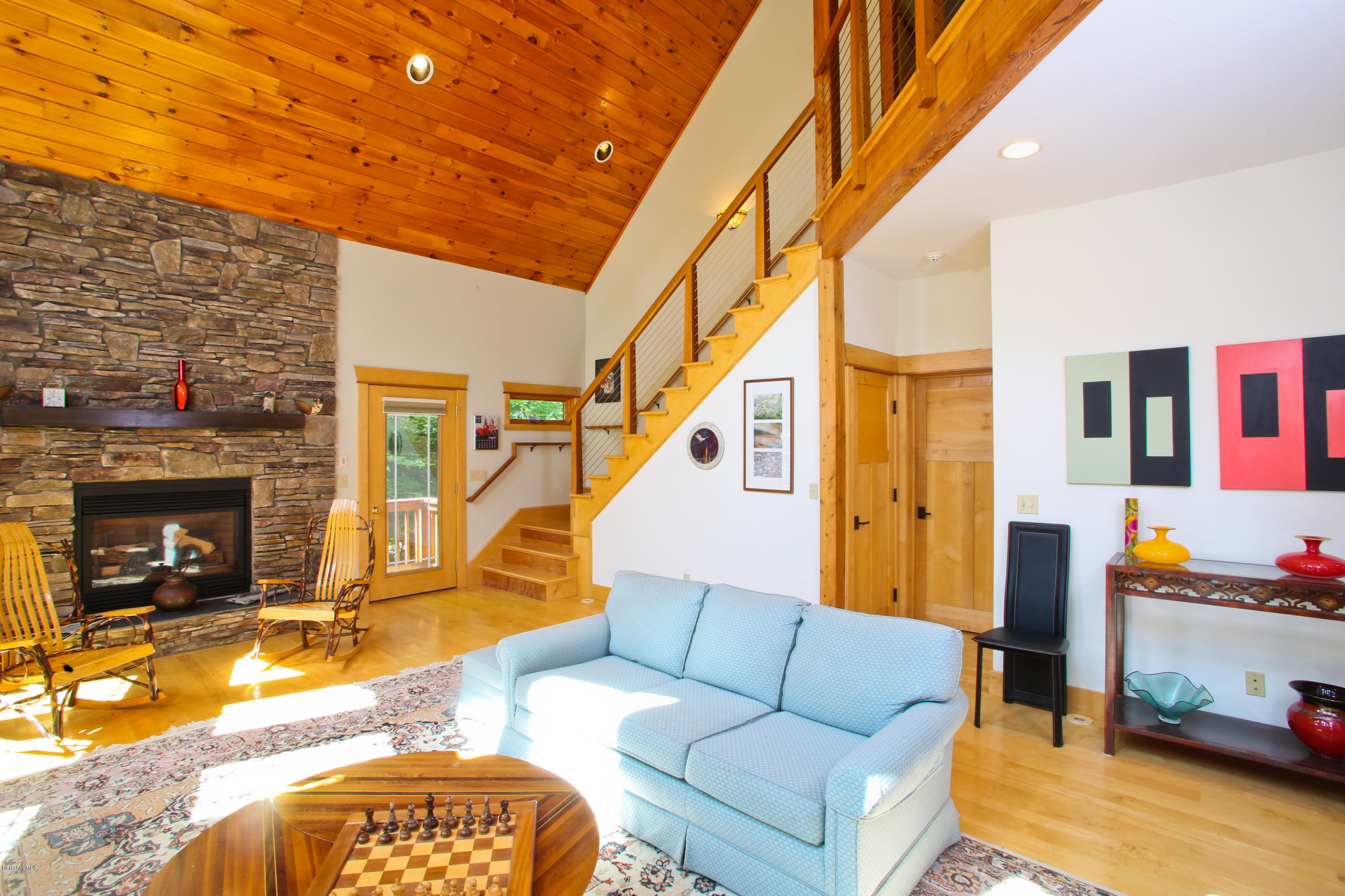 108 Valley View Road Becket, MA 01223 - Photo 8 of 35 a living room with furniture and a fireplace