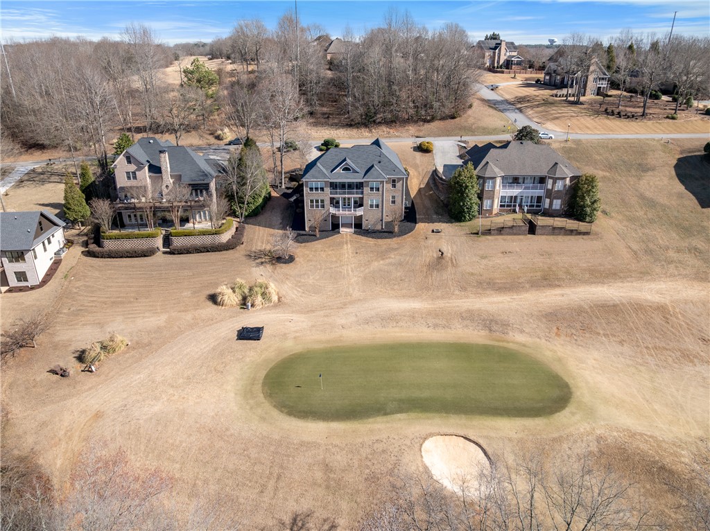 119 Turnberry Road Anderson, SC 29621 - Photo 6 of 50 This elevated view captures homes nestled beside a verdant golf course and surrounding landscape.