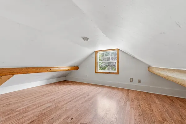 a view of a hallway with a chandelier