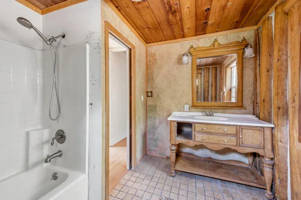 a view of a door and chair in the room