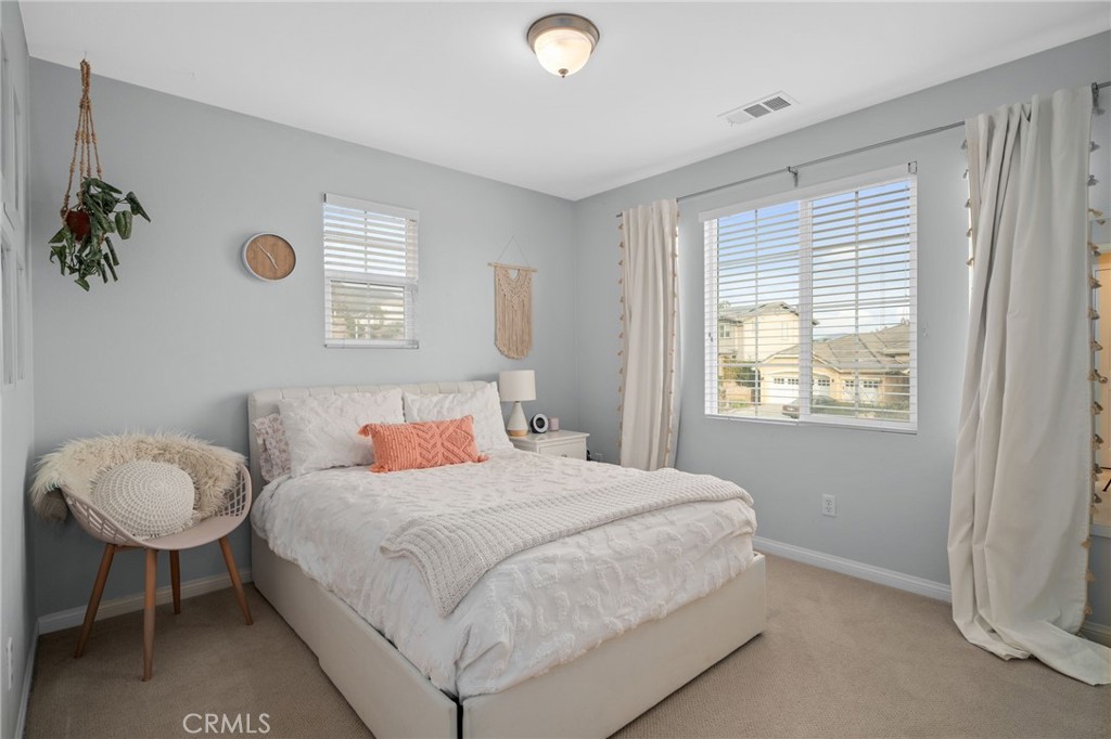 5156 Tahoe Place Rancho Cucamonga, CA 91739 - Photo 28 of 49 a bedroom with a bed and a window