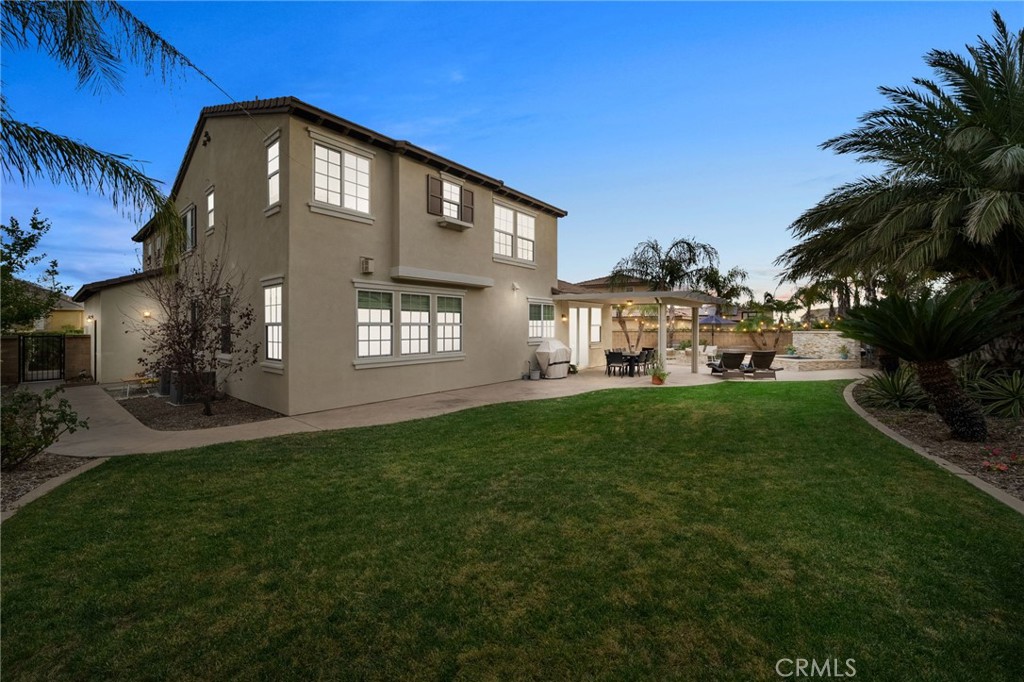 5156 Tahoe Place Rancho Cucamonga, CA 91739 - Photo 32 of 49 a front view of a house with a yard