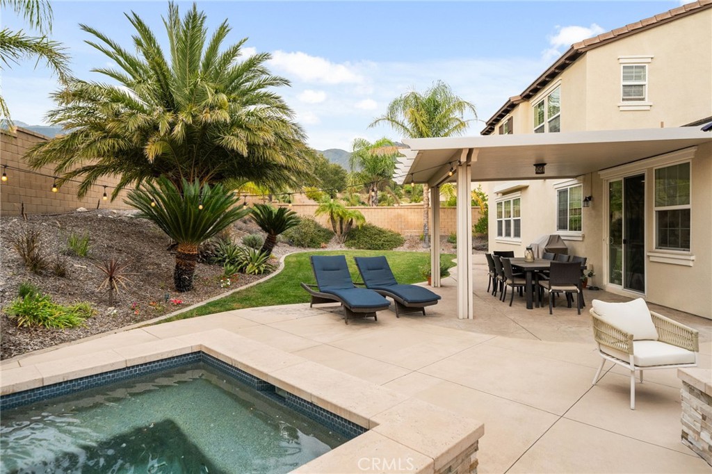 5156 Tahoe Place Rancho Cucamonga, CA 91739 - Photo 36 of 49 a view of a patio with couches chairs and a potted plant