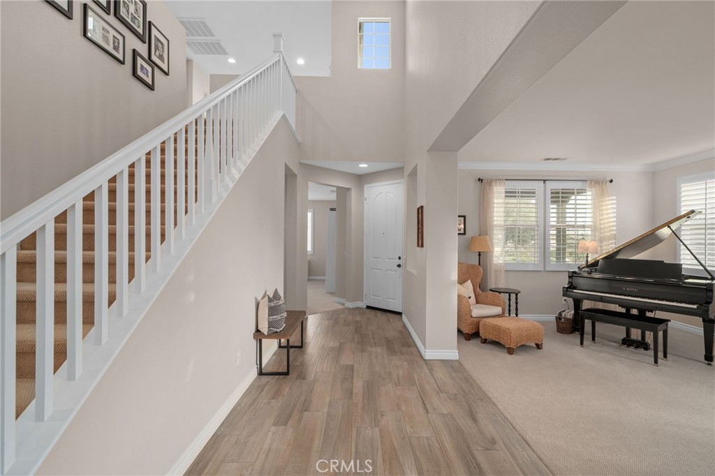5156 Tahoe Place Rancho Cucamonga, CA 91739 - Photo 4 of 49 a view of entryway with wooden floor and furniture
