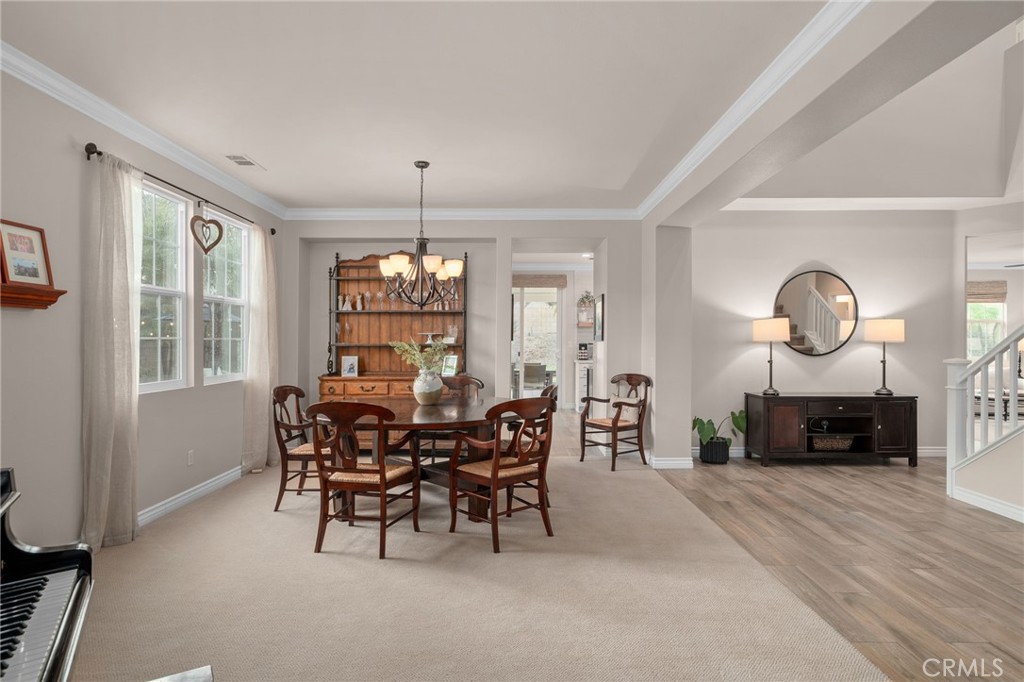 5156 Tahoe Place Rancho Cucamonga, CA 91739 - Photo 6 of 49 a view of a dining room with furniture window and wooden floor