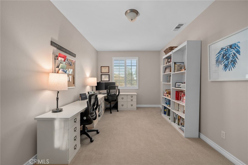 5156 Tahoe Place Rancho Cucamonga, CA 91739 - Photo 9 of 49 a view of a workspace with furniture and a window