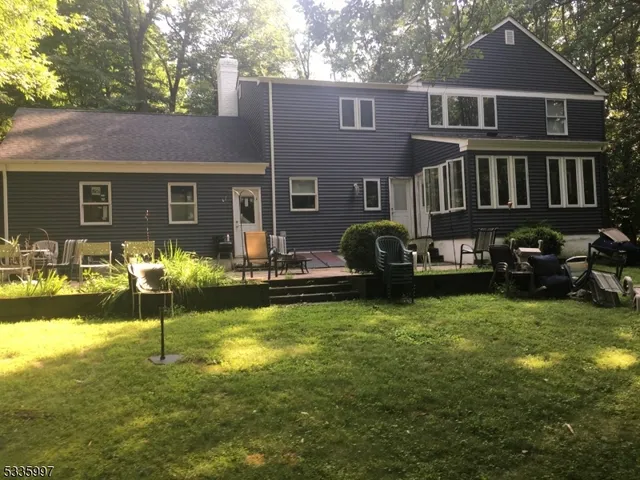 a view of a house with a swimming pool