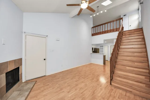 a view of a hallway with staircase