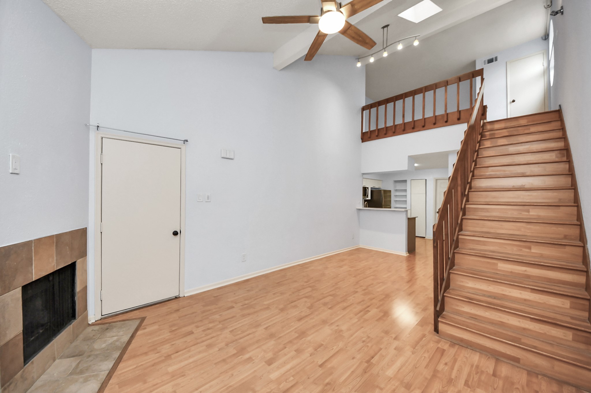 a view of a hallway with staircase