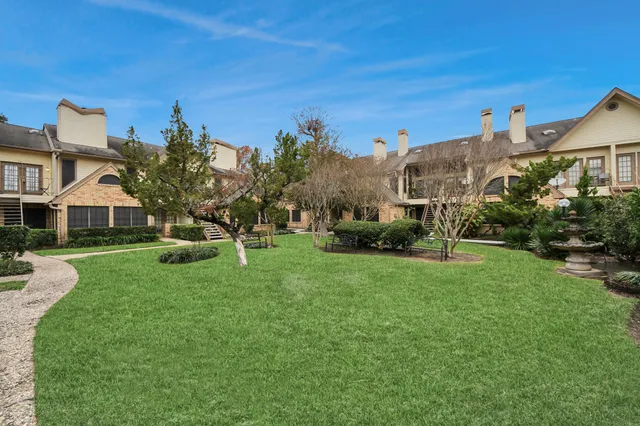 a house view with a garden space