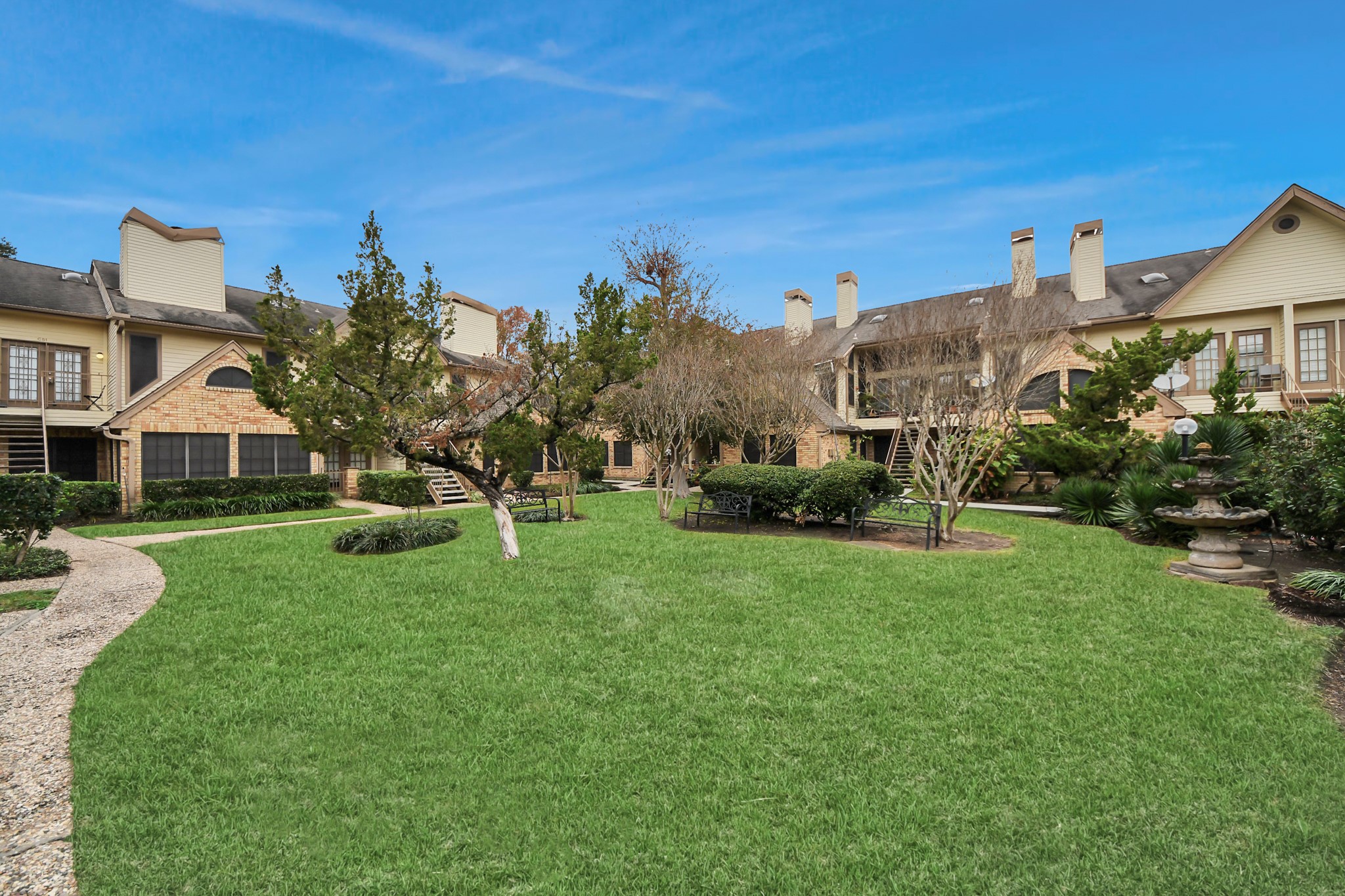 2425 Holly Hall Street, Unit C54 Houston, TX 77054 - Photo 23 of 24 a house view with a garden space