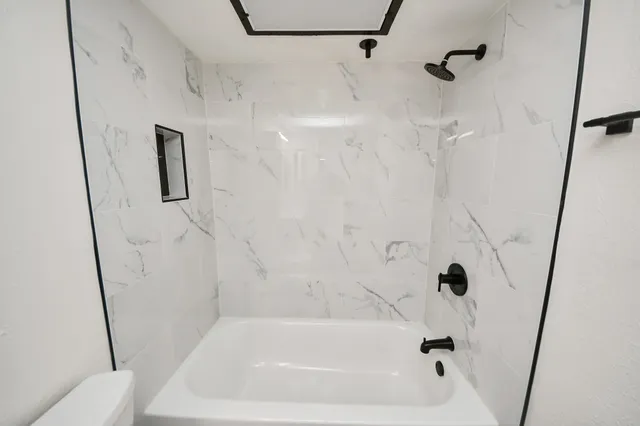 a bathroom with a bathtub