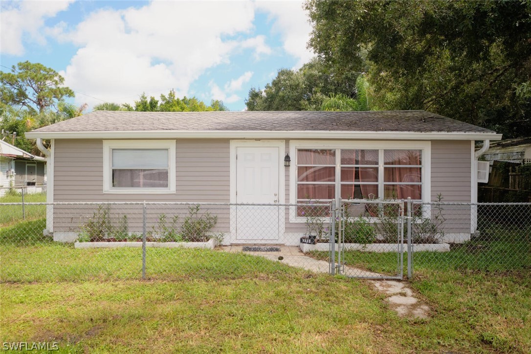 a house view with a backyard space