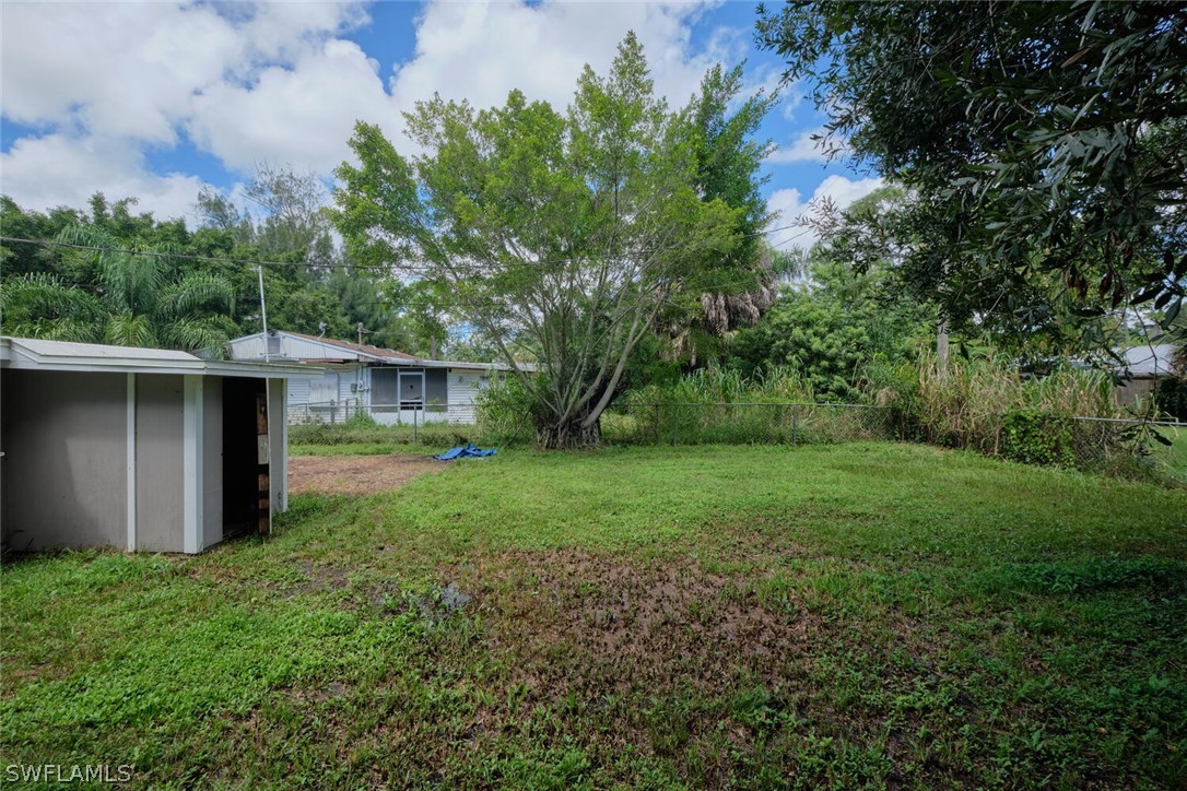 1322 Old Bridge Road North Fort Myers, FL 33917 - Photo 12 of 15 a view of backyard of house with green space