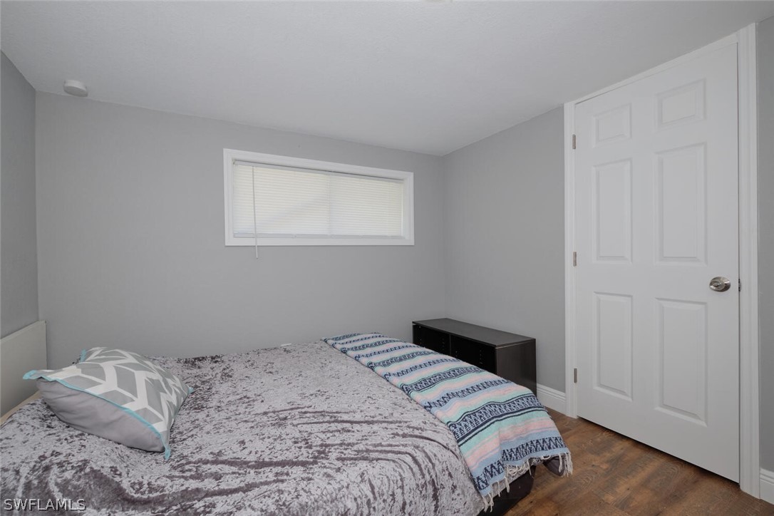 1322 Old Bridge Road North Fort Myers, FL 33917 - Photo 10 of 15 a bedroom with a bed and a window