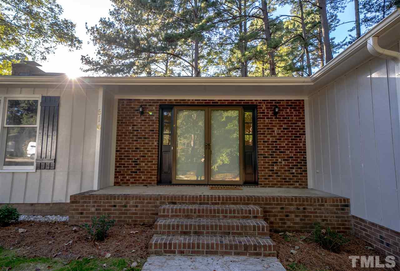 516 Merrie Road Raleigh, NC 27606 - Photo 23 of 29 a view of entrance door of the house