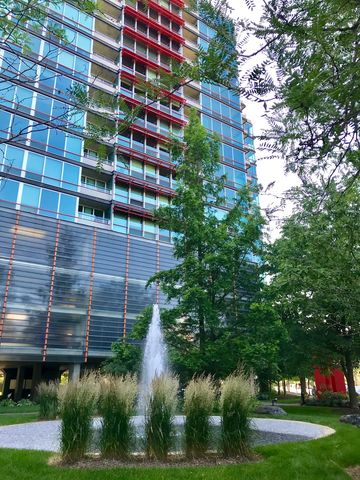 a view of house with garden space and a street view