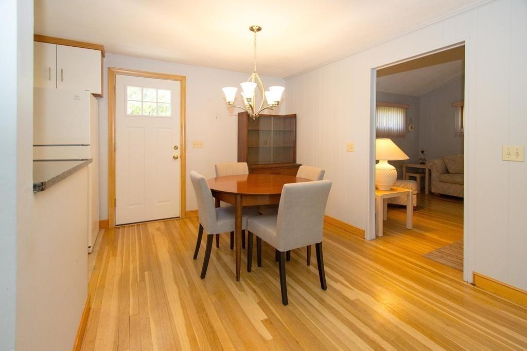 5 Patony Road Framingham, MA 01701 - Photo 12 of 22 a view of a dining room with furniture and wooden floor
