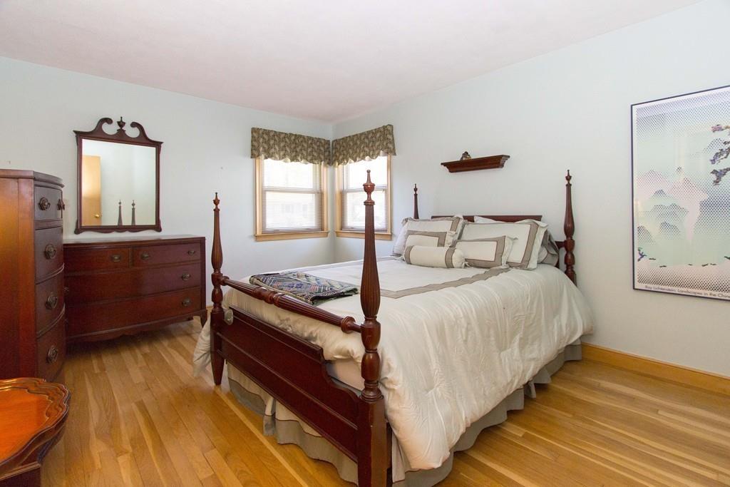5 Patony Road Framingham, MA 01701 - Photo 16 of 22 a bed sitting in a bedroom next to a window