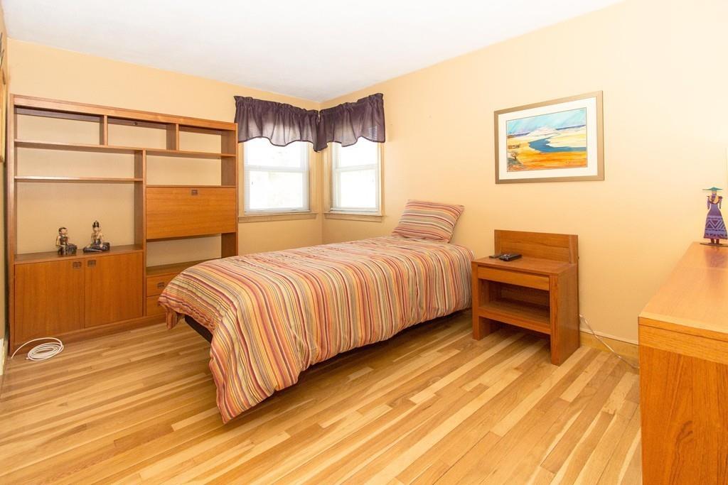 5 Patony Road Framingham, MA 01701 - Photo 17 of 22 a bedroom with a bed and a cabinets