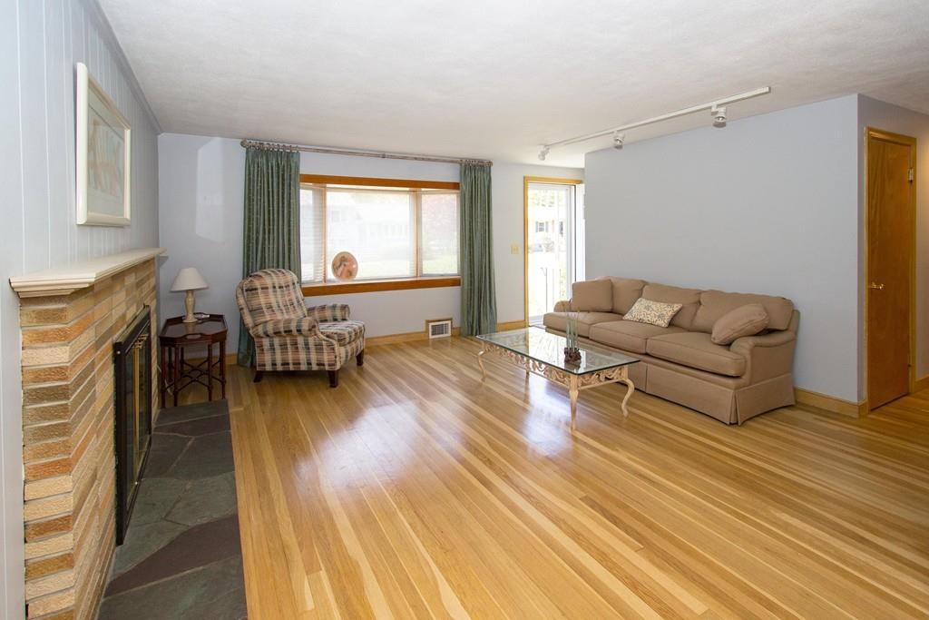 5 Patony Road Framingham, MA 01701 - Photo 4 of 22 a living room with furniture and a wooden floor
