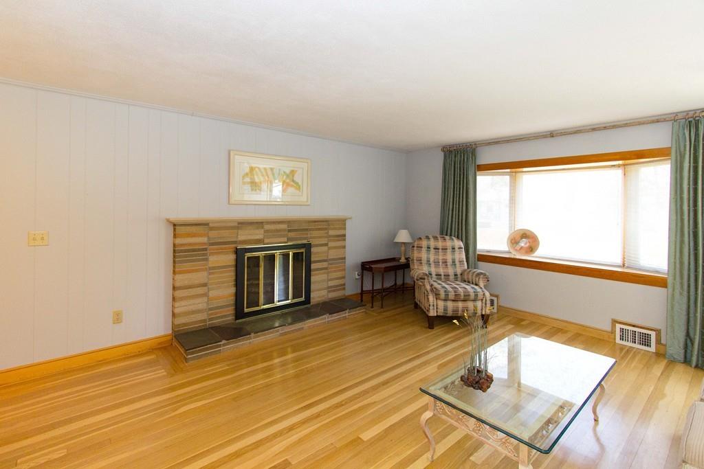5 Patony Road Framingham, MA 01701 - Photo 5 of 22 a living room with furniture and a fireplace