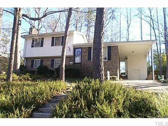 4910 Oak Park Road Raleigh, NC 27612 - Photo 1 of 1 a view of a house with a yard