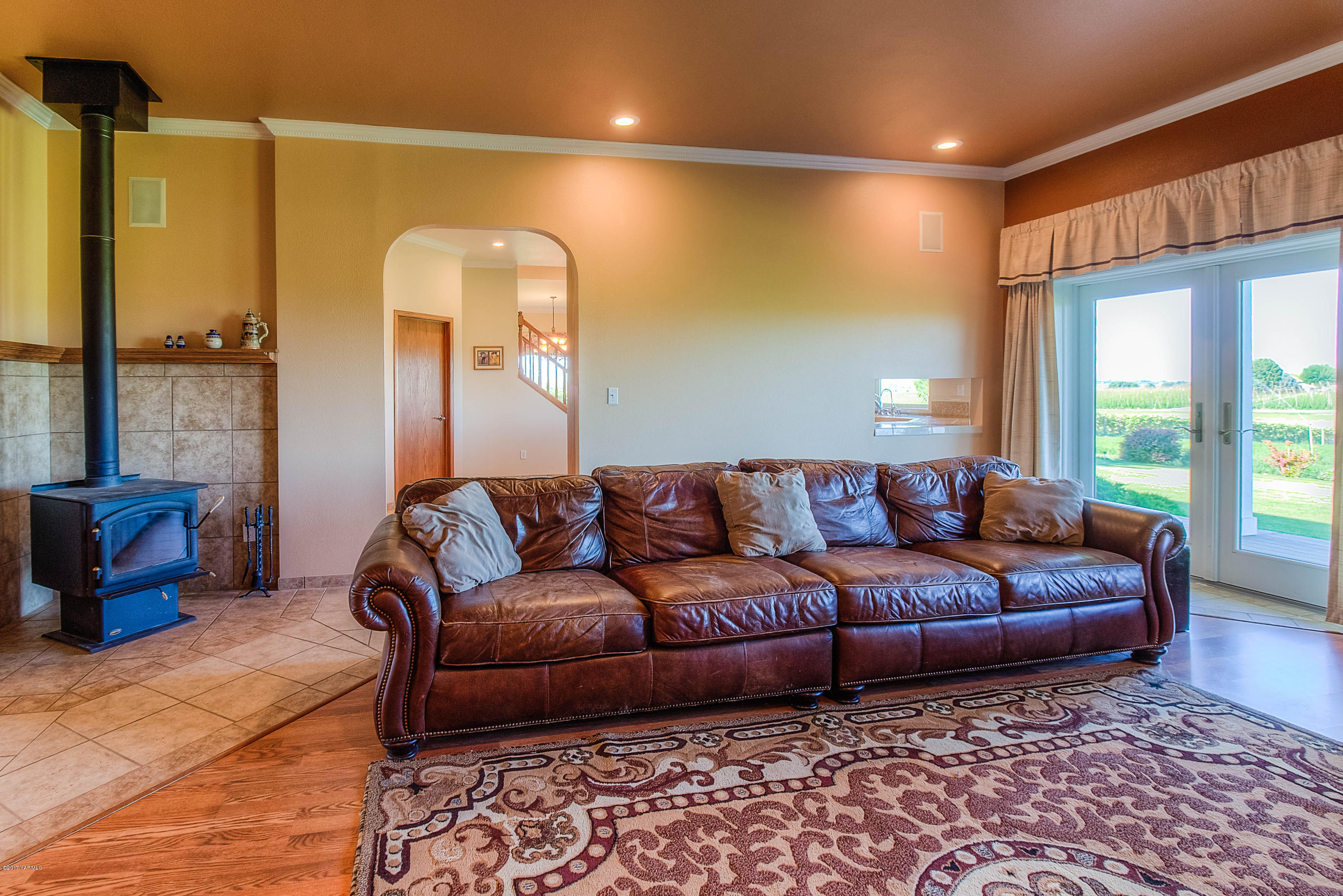 765 Lowry Road Outlook, WA 98938 - Photo 12 of 31 a living room with a couch and a table