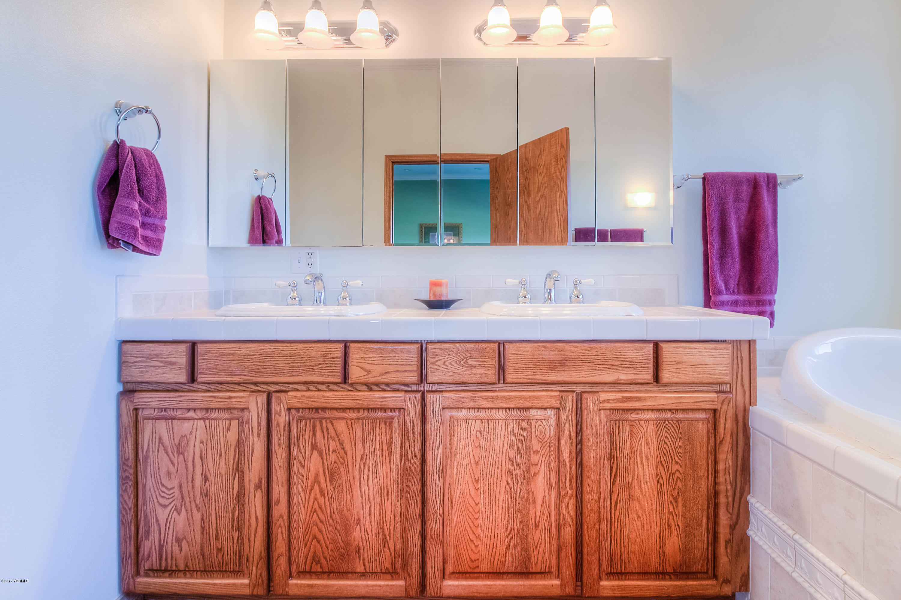 765 Lowry Road Outlook, WA 98938 - Photo 16 of 31 a bathroom with a sink vanity and a mirror