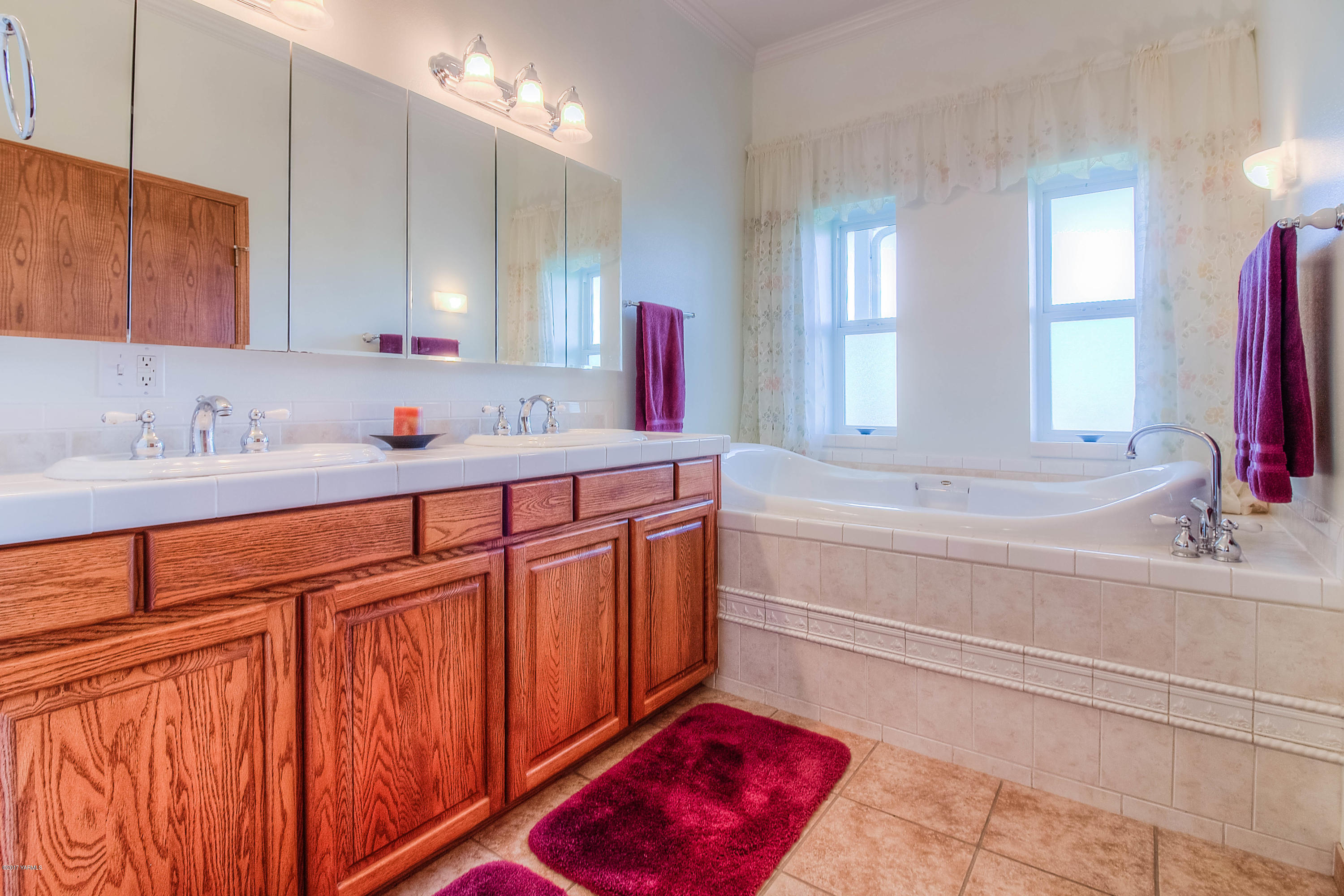 765 Lowry Road Outlook, WA 98938 - Photo 17 of 31 a bathroom with a sink double vanity and a mirror