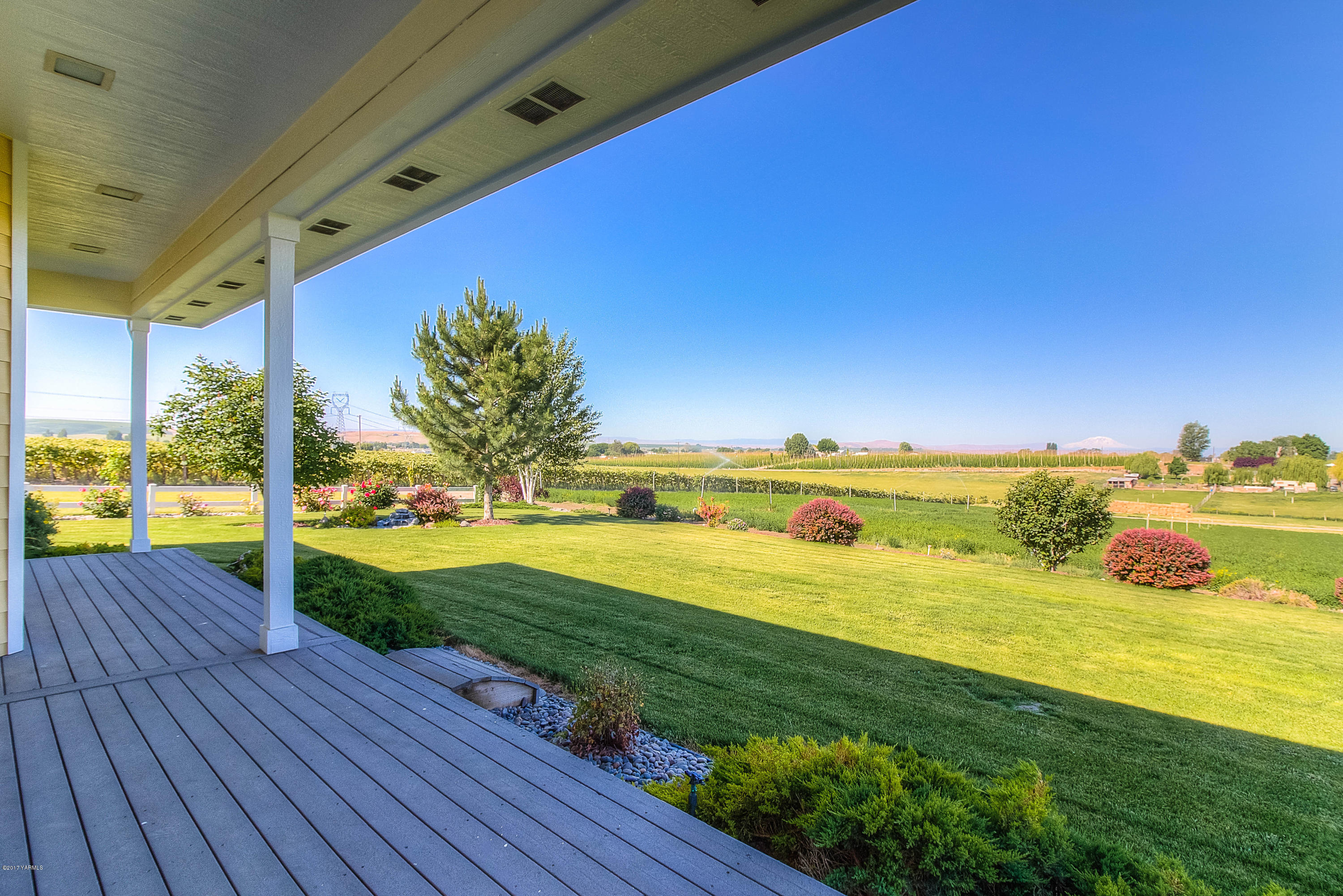 765 Lowry Road Outlook, WA 98938 - Photo 30 of 31 a view of an ocean and a yard