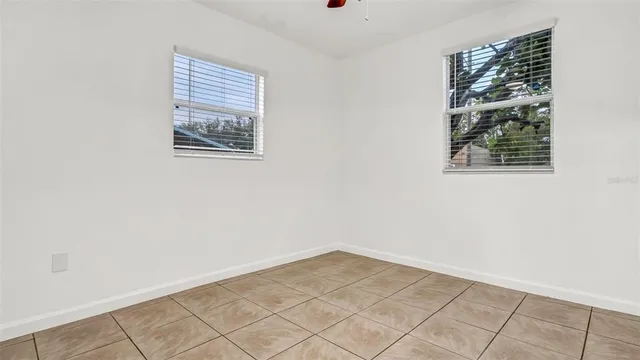 an empty room with windows