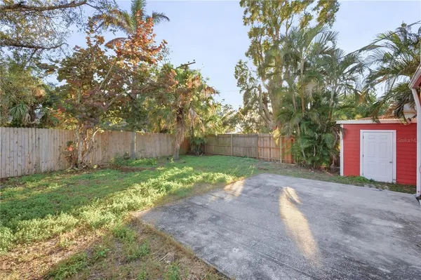 a backyard of a house with lots of green space