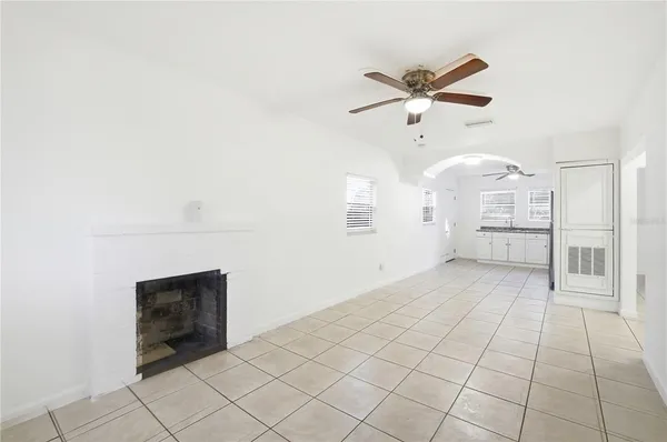 a view of a livingroom with an furniture and fireplace